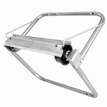 ProEquip roll dispenser with cutter mounted on wall above work station