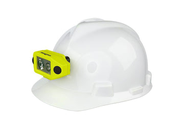 Nightstick Intrinsically Safe Dual-Light Headlamp mounted on hard hat with hard hat clip