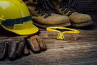 Safety and protection equipment on a wooden floor