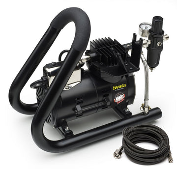 Iwata Smart Jet Plus tubular airbrush compressor with carry handle tank and mounted airbrush holder